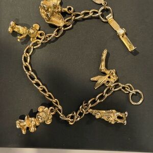 Disney bundle! Gold Disney character Charm Bracelet and Tigger earrings